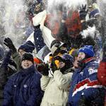 Patriots fans celebrated a victory at snowy Gillette Stadium in 2003. Owner Robert Kraft will have a strong voice in efforts to bring the Super Bowl to town.
