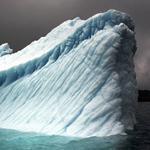 Camille Seaman’s “Breaching Iceberg — Greenland, August 8, 2008.”