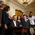 President Obama  signed the measure Wednesday in a White House ceremony where he was flanked by Americans who would make more money if lawmakers take more sweeping action.