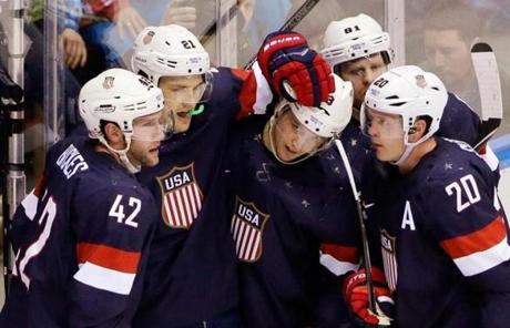 US players celebrated a second-period goal.
