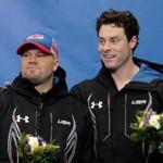 Bronze medalists Steven Holcomb (left) and Steven Langton during the flower ceremony after the two-man bobsled (Photo by Adam Pretty/Getty Images)