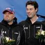 Bronze medalists Steven Holcomb (left) and Steven Langton during the flower ceremony after the two-man bobsled.