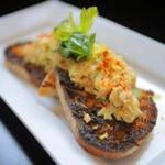 Row 34’s crab toast with smoked paprika and celery salad.