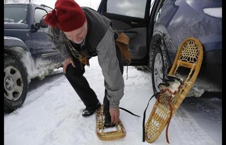 Roger Knowlton, 62, of Cabot, Vt., stepped into a snowshoe as he prepares to compete in the biathlon.
