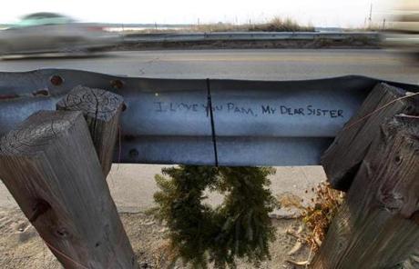 A memorial to Pam Wells, a mother of two, marks a Seabrook, N.H., bridge where she and another bicyclist were killed.

