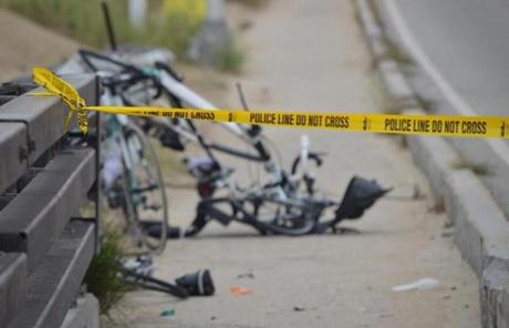 Police say Darriean Hess drove into the cyclists, who were on an organized ride. Two others were hurt.
