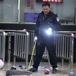 A police investigator viewed the scene in a rail depot, where assailants armed with knives assaulted travelers in Kunming, in southwest China. No group has claimed responsibility. 