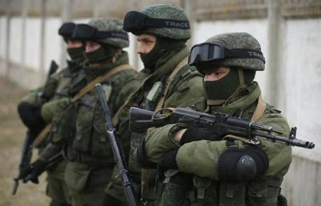 Soldiers took up positions around a Ukrainian military base in Crimea.
