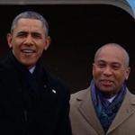 President Obama was joined by Governor Deval Patrick as he stepped off Air Force One at Logan Airport Wednesday.