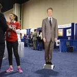Volunteers waited for guests to be photographed with a cardboard cutout of Senator Rand Paul of Kentucky on Thursday at the Conservative Political Action Conference in Oxon Hill, Md.