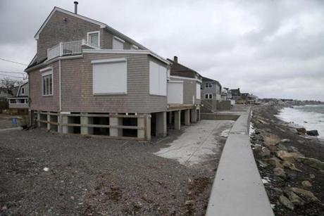 The house at 48 Oceanside Drive in Scituate has been destroyed and rebuilt several times.
