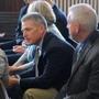 Brothers Shawn (right) and Mark O’Hagan (center) sat in court in St. Johnsbury, Vt., before the arraignment of Richard Fletcher and Keith Baird Monday. Shawn called it “the final chapter of this process.”