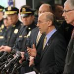 Kurt Schwartz (second right), head of the Mass. Emergency Management Agency, addressed law enforcement officials.