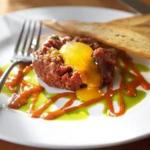 Steak tartare with red curry and Southeast Asian herbs