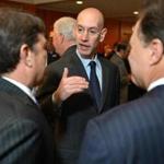 NBA commissioner Adam Silver (center) mingles with attendees before speaking at the Boston College Chief Executives’ Club luncheon at the Mandarin Oriental Hotel.