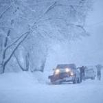 A snowplow cleared roads and driveways in Kalamazoo, Mich.