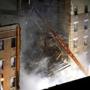 Firefighters were at the scene of a fire and building collapse at 1646 Park Ave. in New York Wednesday night.