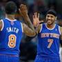 Carmelo Anthony smiled as he high-fived teammate J.R. Smith in the first half.