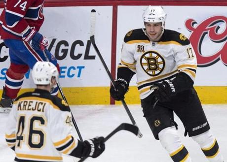 Milan Lucic celebrated his goal in the second period with David Krejci.
