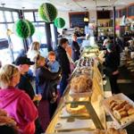 Customers line up for soda bread and other treats at Greenhills Irish Bakery in Dorchester on a recent Saturday morning. 