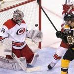 David Krejci watched as a shot by Jarome Iginla went past Carolina goalie Cam Ward for the second goal of the game. 