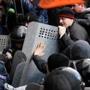 Pro-Russian protesters pushed past Ukrainian police in Donetsk.