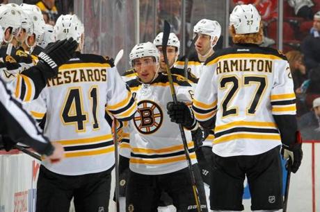 Brad Marchand celebrated his second-period short-handed goal against the Devils.
