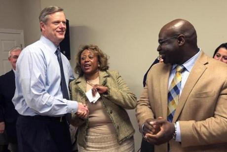 Rachel Kemp, with Charlie Baker at a preconvention rally in Hyde Park, has been reaching out to communities of color.
