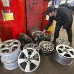Tim Haynes worked at Direct Tire and Auto Service, which is doing much more business this winter. Tire sales are up 26 percent.