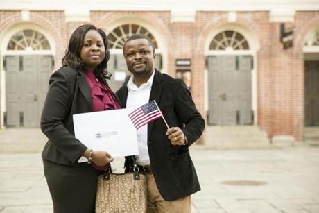 Uchenna and Ted Onuoha, from Nigeria, posed outside Faneuil Hall this month after becoming US citizens.
