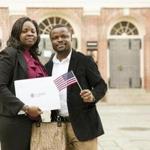 Uchenna and Ted Onuoha, from Nigeria, posed outside Faneuil Hall this month after becoming US citizens.