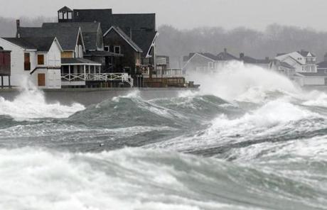 Wind-driven waves come ashore in Scituate as a blizzard struck the Mass. coast.
