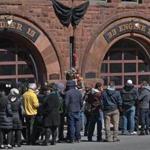 People and media lined up outside Engine 33 on Thursday.