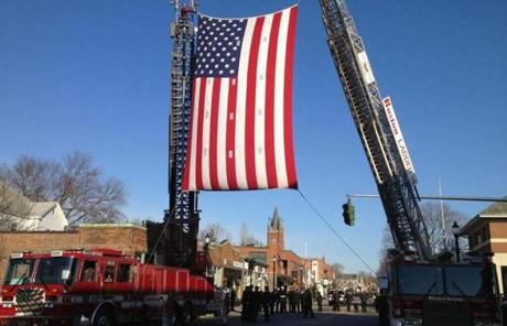 On the first of three days of memorials for the fallen firefighters, mourners waited for hours under a pale blue sky to pay tribute to Walsh.
