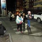 People evacuated their homes in Iquique, Chile, on Thursday after a strong aftershock struck nearby.