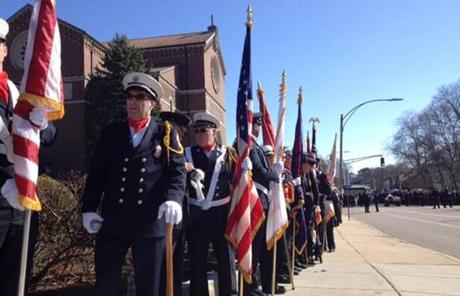 Thousands of firefighters have come to West Roxbury to honor Kennedy.

