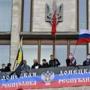 Pro-Russian protesters displayed a banner at the regional government building in Donetsk, in eastern Ukraine.