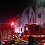 Firefighters battled an eight-alarm blaze that started on Lexington Street Wednesday night. No residents were injured.