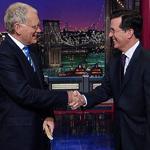 Stephen Colbert (right) will succeed David Letterman as host of CBS’s “Late Show” next year.