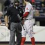 Grady Sizemore has words with plate umpire Brian O'Nora after lining out to end the game. 