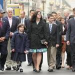 Family members of Marathon bombing victims Martin Richard, Krystle Campbell, and Lu Lingzi were joined by  Governor Patrick (left) and Boston Mayor Martin  Walsh (right) at a wreath-laying ceremony in Copley Square.