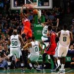 The Wizards’ Trevor Booker dunks over a crowd of hapless Celtics defenders. 


 (Photo by Jared Wickerham/Getty Images)
