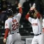 Daniel Nava (left) and Jonathan Herrera celebrated after scoring on a 14th-inning double by Jackie Bradley Jr.
