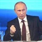 Russian President Vladimir Putin gestured Thursday while speaking during his annual call-in live broadcast in Moscow. 