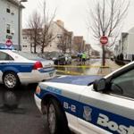 Police investigated the scene of a shooting in Mission Hill in March.