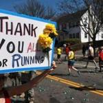 As morning turned to afternoon, the leg muscles of many in the later waves of runners began to falter along Heartbreak Hill in Newton, but not the encouragement. Many fans make it a point year after year to cheer the runners on here.  