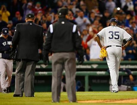 Michael Pineda of the Yankees walks to the dugout after his ejection in the second inning. Jared Wickerham/Getty Images
