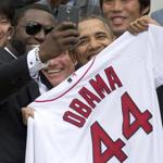 Red Sox designated hitter David Ortiz snaps the now-infamous selfie with President Obama at the White House.