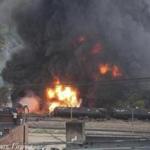 Flames and a large plume of black smoke were shown after a train derailment in Lynchburg, Va.