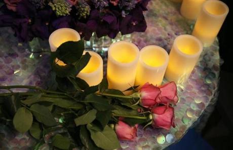 Flowers and candles at Williams’s event at the Lenox Hotel in Boston.
